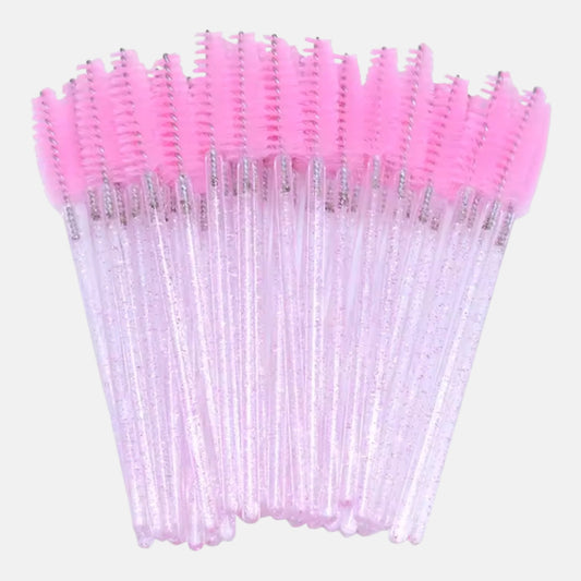 Pink disposable eyelash extension mascara wands with soft spoolie brushes for lash grooming and aftercare