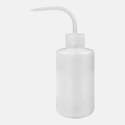 Clear plastic squeeze bottle for washing and rinsing eyelash extensions