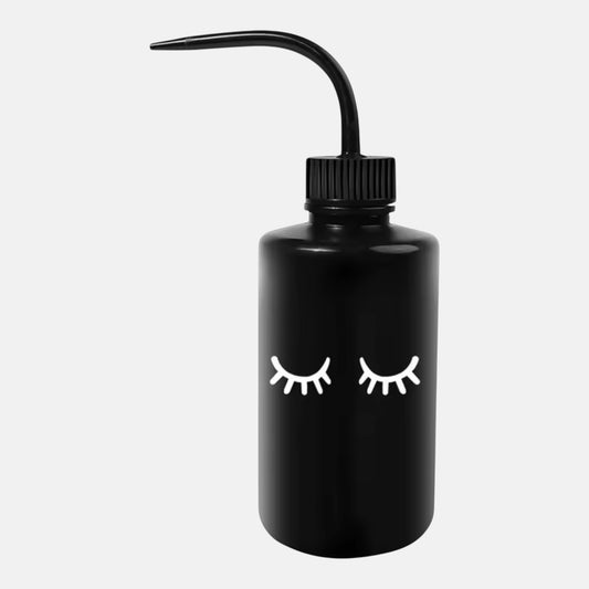 Black squeeze bottle with eyelash logo for eyelash extensions with precision nozzle and eyelash design, ideal for lash cleanser, saline, and rinsing solutions