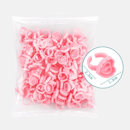 Pink heart-shaped disposable blossom rings for eyelash extensions and volume lash fan creation