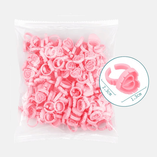 Pink heart-shaped disposable blossom rings for eyelash extensions and volume lash fan creation