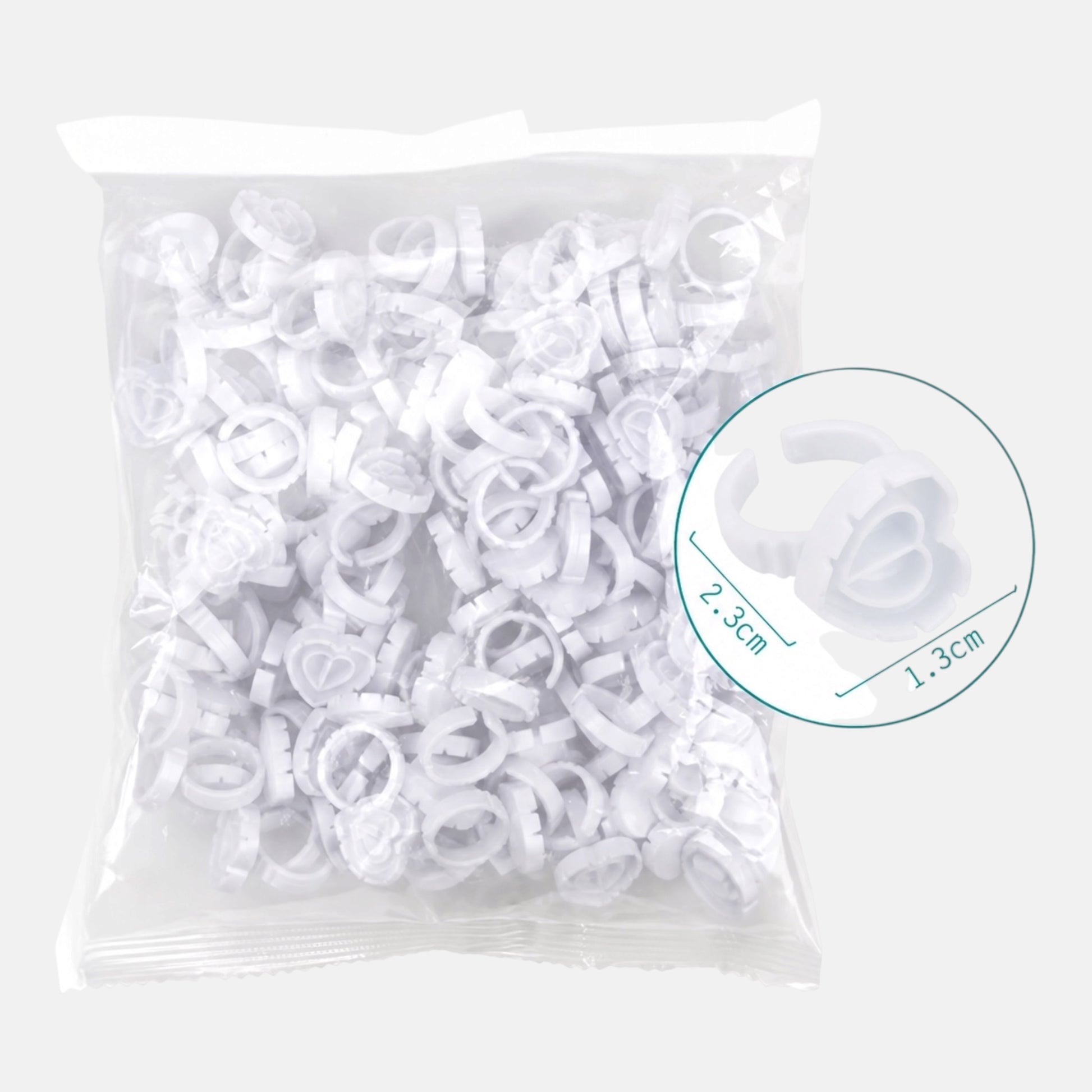 White heart-shaped disposable blossom rings for eyelash extensions and volume lash fan creation