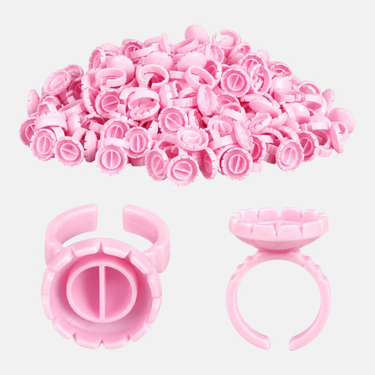 Pink disposable lash glue rings for eyelash extensions with adhesive holder cups for professional application