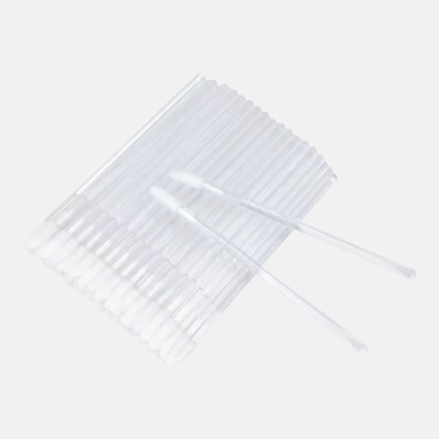 Clear disposable lint-free lip gloss applicators for eyelash extensions and beauty applications