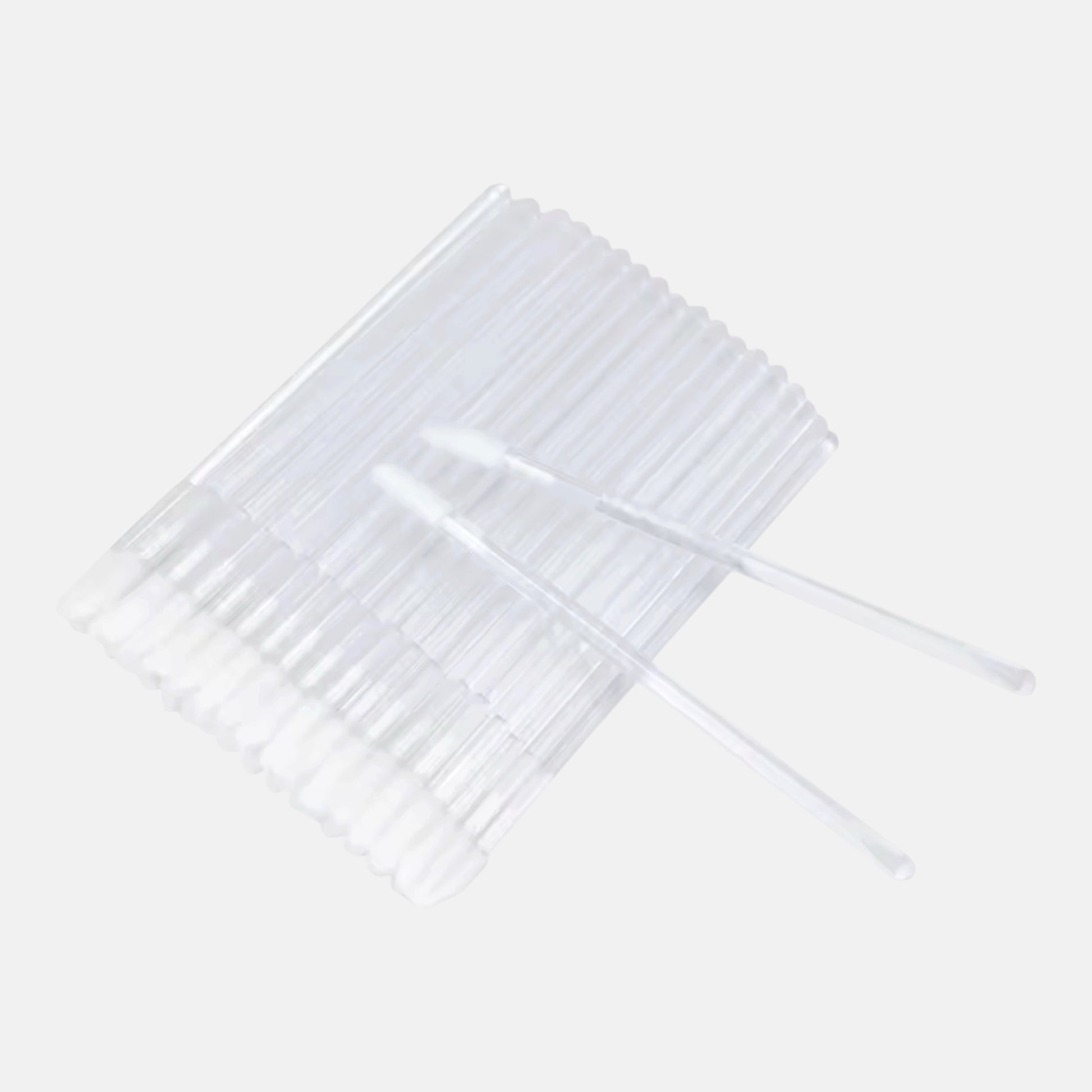 Clear disposable lint-free lip gloss applicators for eyelash extensions and beauty applications