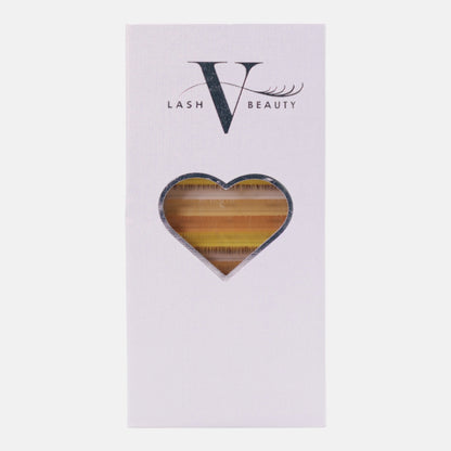 Golden Hour colored lash extension tray featuring warm golden yellow and amber shades for radiant lash sets and sun-kissed lash artistry.